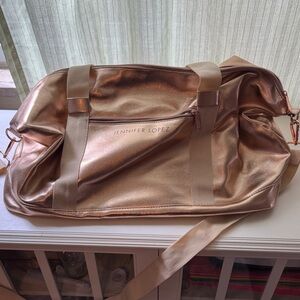 Jennifer Lopez Shimmering Rose Gold Duffel Bag